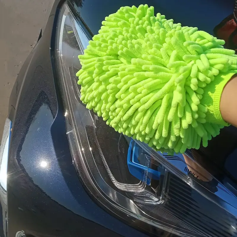 Glove cleaning car headlight